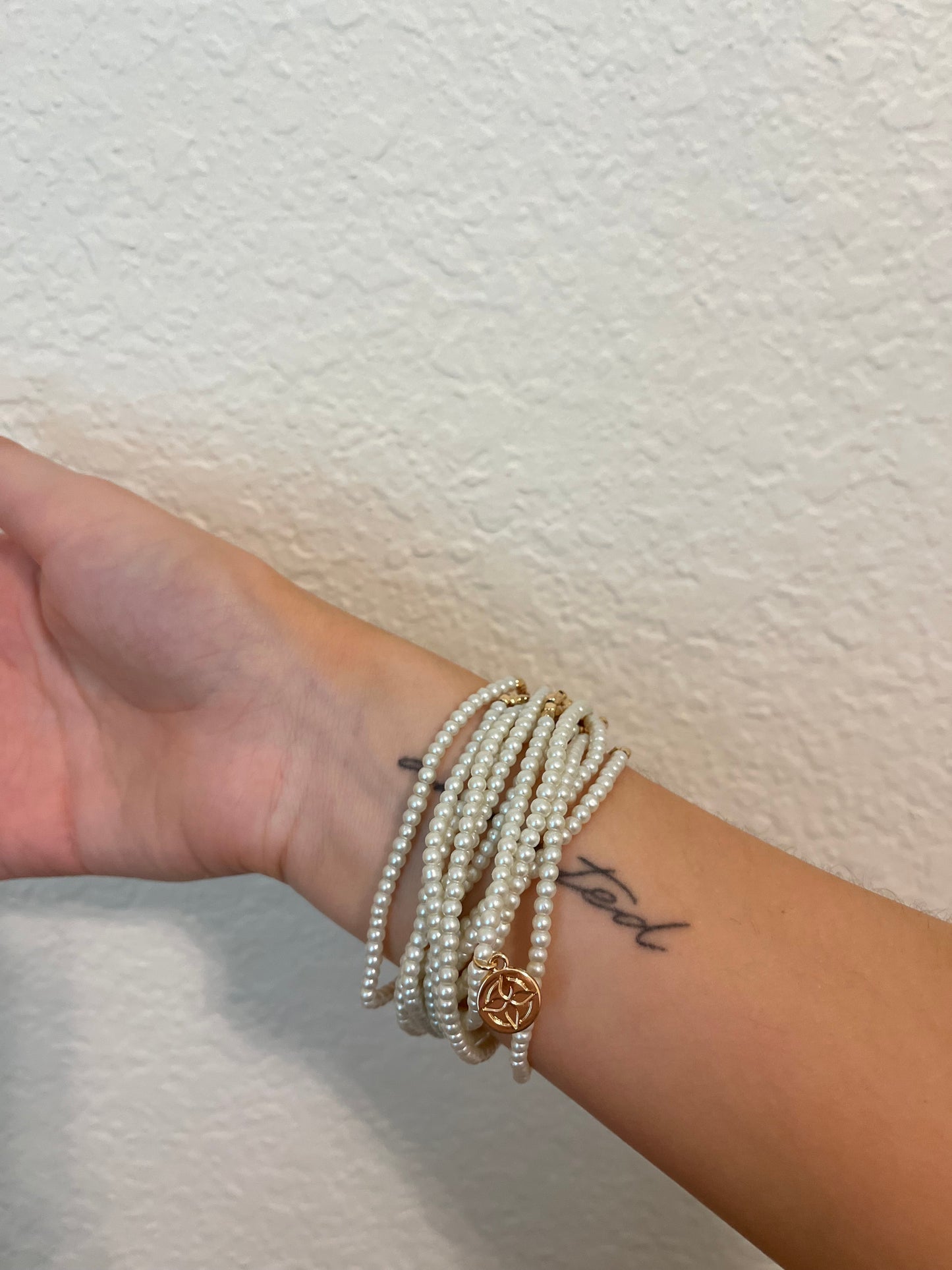 Multi-Strand Pearl Bracelet with Gold Accents