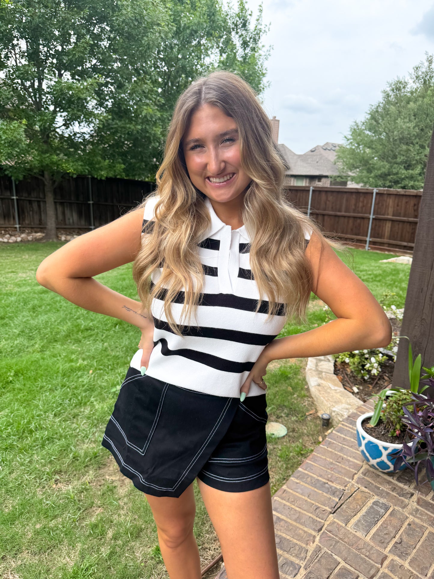 Sleeveless Black & White Striped Polo Top